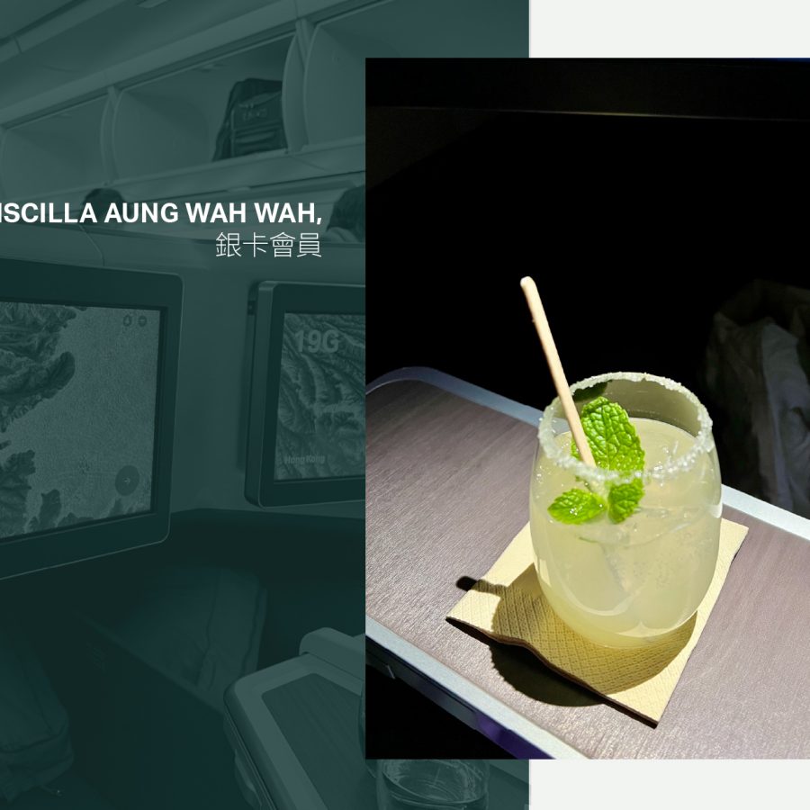A glass of the Cathay Delight mocktail on the pull-out tray on board a Cathay Pacific flight